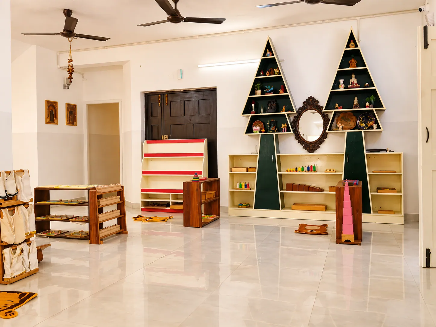 Prepared Montessori classroom with wooden shelves and child-scaled learning materials